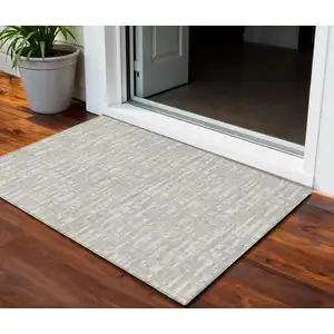 Photo of Beige And Gray Abstract Washable Indoor Outdoor Area Rug