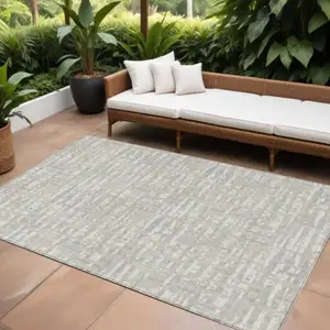 Photo of Beige And Gray Abstract Washable Indoor Outdoor Area Rug
