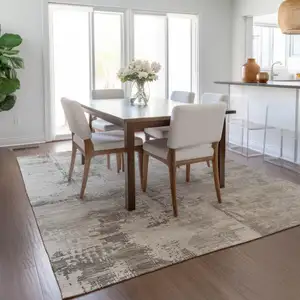 Photo of Beige And Gray Abstract Washable Indoor Outdoor Area Rug