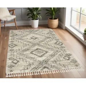 Photo of Beige And Gray Geometric Shag Non Skid Area Rug With Fringe