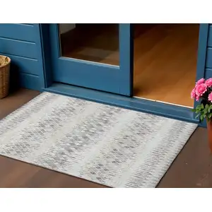 Photo of Beige And Gray Ikat Washable Indoor Outdoor Area Rug