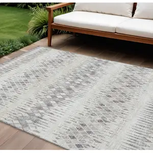 Photo of Beige And Gray Ikat Washable Indoor Outdoor Area Rug