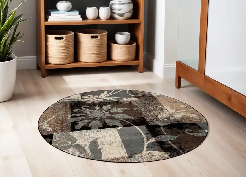 5' Beige Black And Brown Floral Distressed Round Rug Photo 1