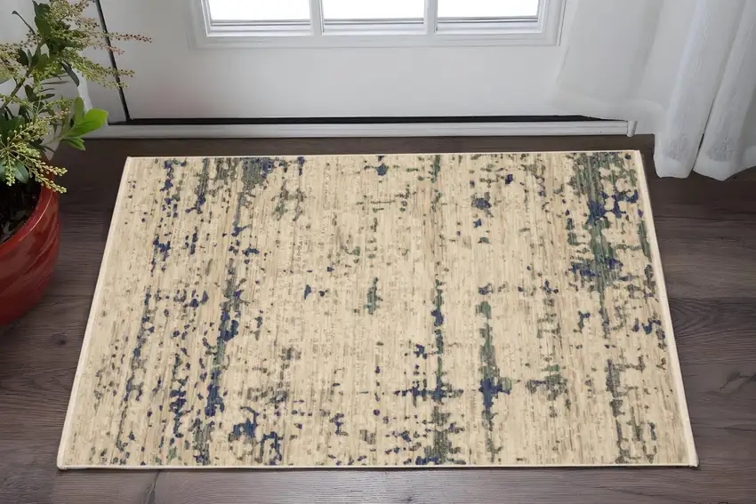 Beige And Green Abstract Area Rug With Fringe Photo 1