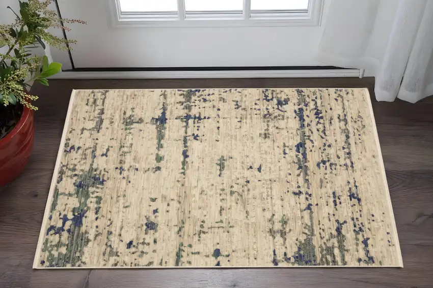 Beige And Green Abstract Area Rug With Fringe Photo 1