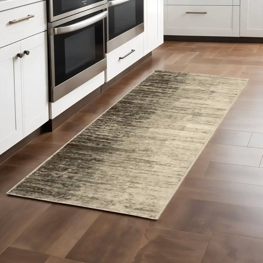 2' X 8' Beige And Grey Abstract Power Loom Stain Resistant Runner Rug Photo 1