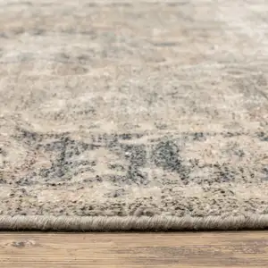Photo of Beige And Grey Oriental Hand Loomed Stain Resistant Area Rug With Fringe