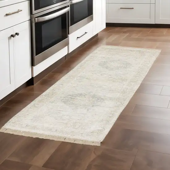 8' Beige and Ivory Oriental Hand Loomed Runner Rug With Fringe Photo 1