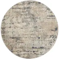 Photo of Beige And Grey Round Abstract Power Loom Non Skid Area Rug