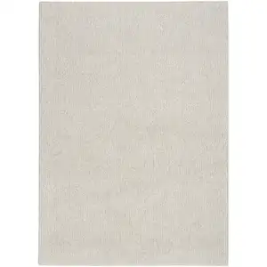 Photo of Beige And Ivory Abstract Area Rug