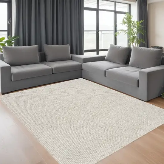 Beige And Ivory Abstract Area Rug Photo 1