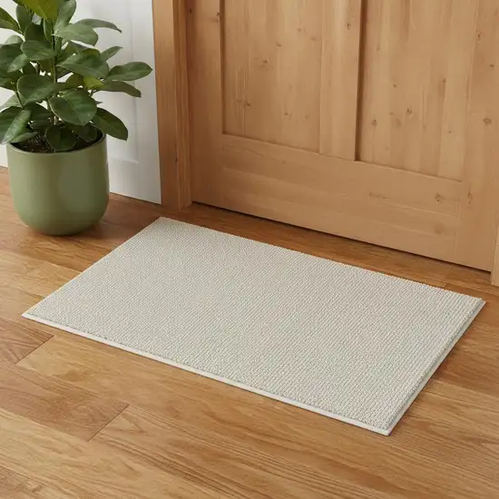 Beige And Ivory Abstract Area Rug Photo 1