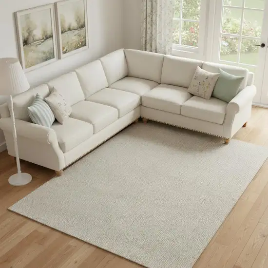 Beige And Ivory Abstract Area Rug Photo 1