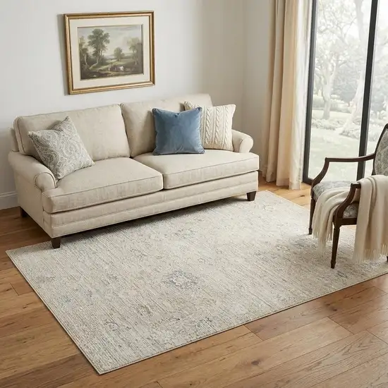Beige And Ivory Abstract Area Rug Photo 1