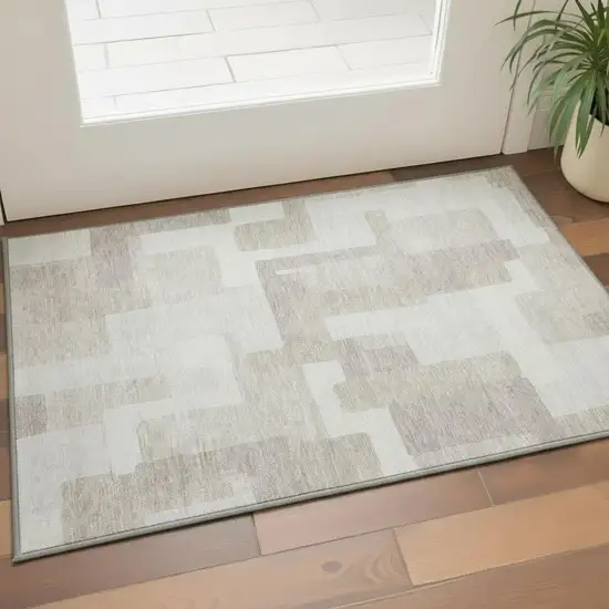Beige And Ivory Abstract Geometric Washable Area Rug With UV Protection Photo 2