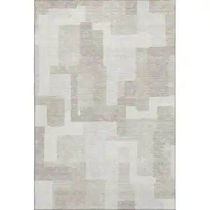 Photo of Beige And Ivory Abstract Geometric Washable Area Rug With UV Protection