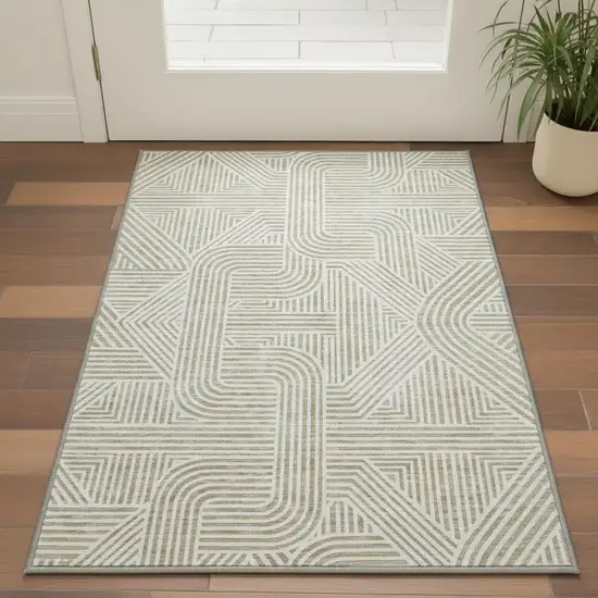 Beige And Ivory Abstract Geometric Washable Area Rug With UV Protection Photo 2