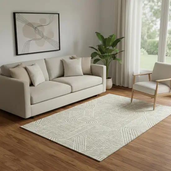 Beige And Ivory Abstract Geometric Washable Area Rug With UV Protection Photo 1