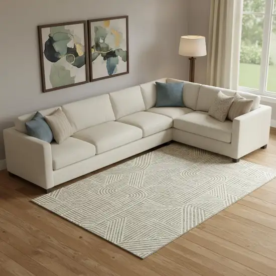 Beige And Ivory Abstract Geometric Washable Area Rug With UV Protection Photo 1