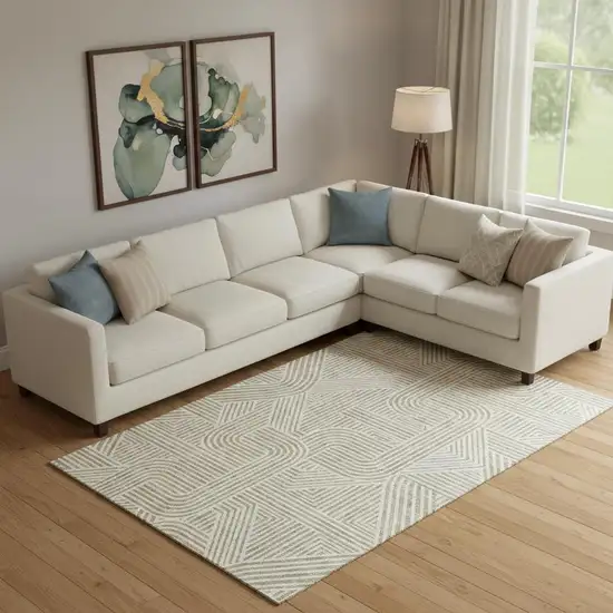 Beige And Ivory Abstract Geometric Washable Area Rug With UV Protection Photo 1