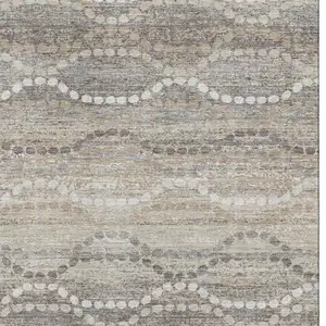 Photo of Beige And Ivory Abstract Geometric Washable Area Rug With UV Protection