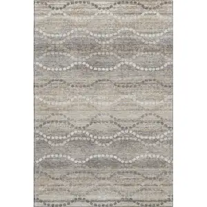 Photo of Beige And Ivory Abstract Geometric Washable Area Rug With UV Protection