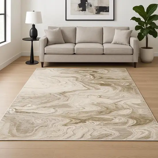 6' X 9' Beige And Ivory Abstract Power Loom Stain Resistant Area Rug Photo 1