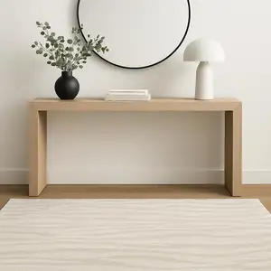 Photo of Beige And Ivory Abstract Shag Area Rug