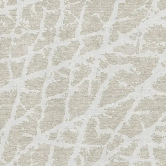 Beige And Ivory Abstract Washable Area Rug With UV Protection Photo 3