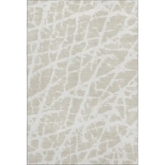 Beige And Ivory Abstract Washable Area Rug With UV Protection Photo 1