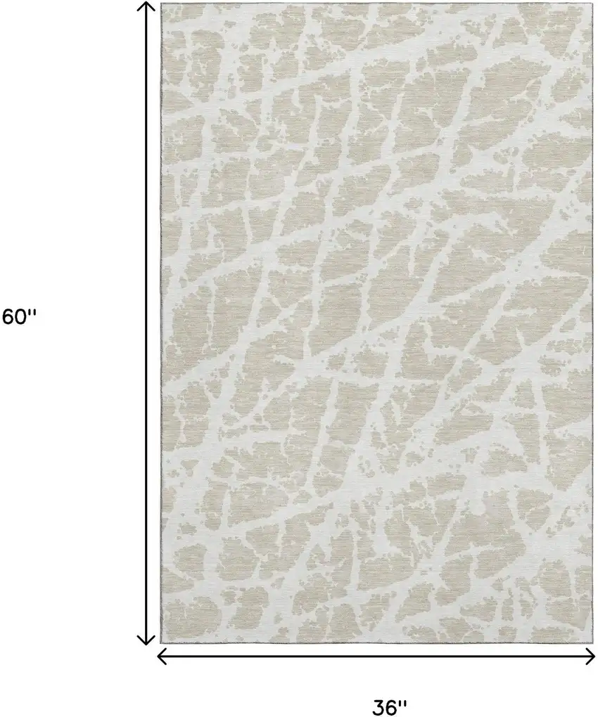 Beige And Ivory Abstract Washable Area Rug With UV Protection Photo 3