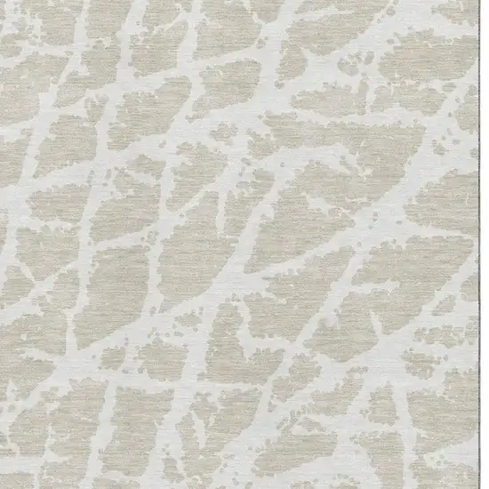 Beige And Ivory Abstract Washable Area Rug With UV Protection Photo 3