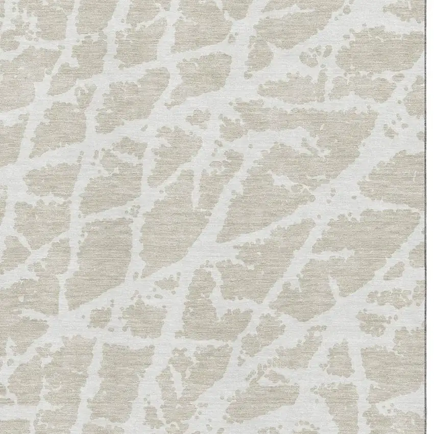 Beige And Ivory Abstract Washable Area Rug With UV Protection Photo 3