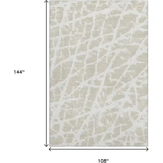 Beige And Ivory Abstract Washable Area Rug With UV Protection Photo 3