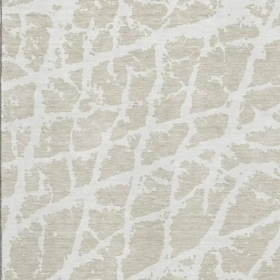 Beige And Ivory Abstract Washable Area Rug With UV Protection Photo 3