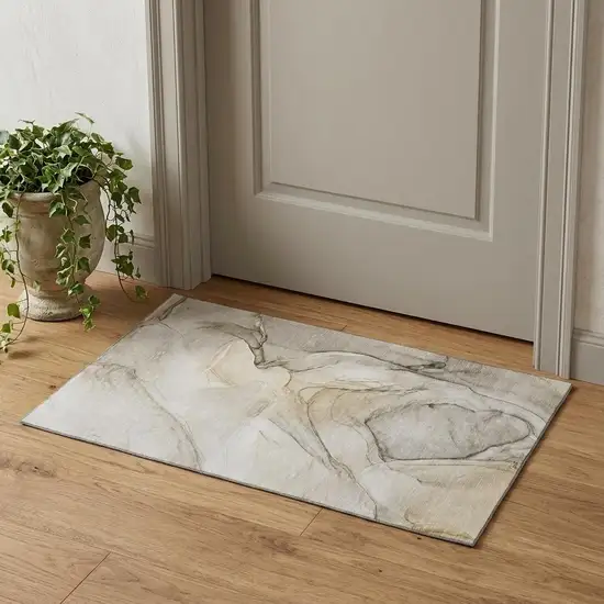 Beige And Ivory Abstract Washable Area Rug With UV Protection Photo 1