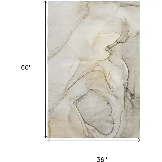 Beige And Ivory Abstract Washable Area Rug With UV Protection Photo 3