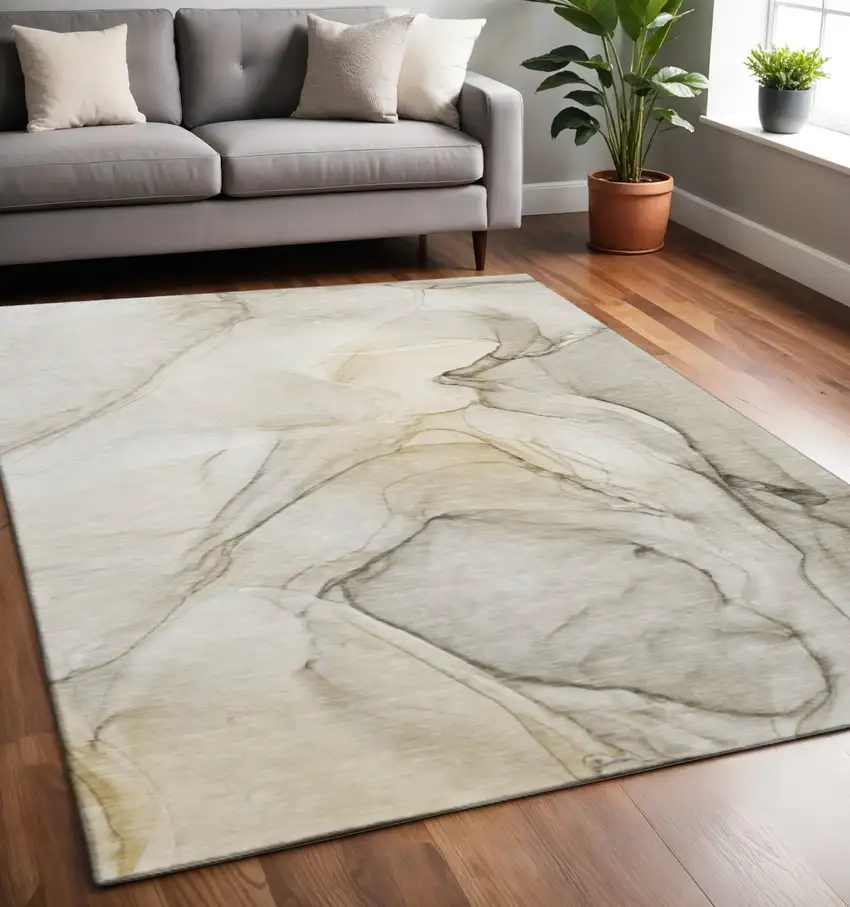 Beige And Ivory Abstract Washable Area Rug With UV Protection Photo 2