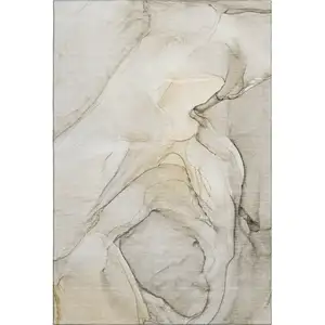 Photo of Beige And Ivory Abstract Washable Area Rug With UV Protection