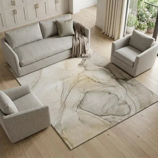Beige And Ivory Abstract Washable Area Rug With UV Protection Photo 1