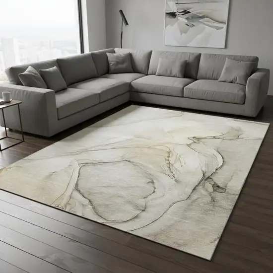 Beige And Ivory Abstract Washable Area Rug With UV Protection Photo 1