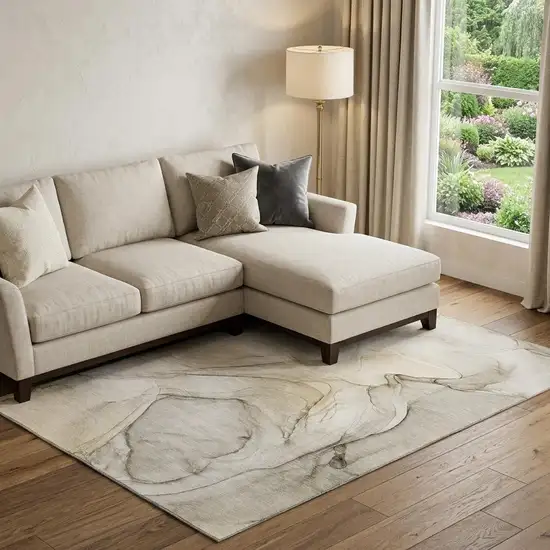 Beige And Ivory Abstract Washable Area Rug With UV Protection Photo 1