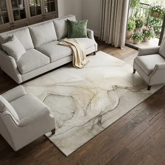 Beige And Ivory Abstract Washable Area Rug With UV Protection Photo 1