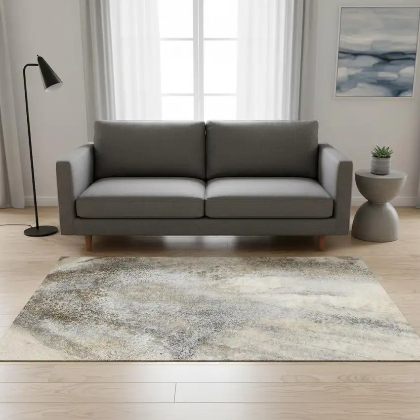 Beige And Ivory Abstract Washable Area Rug With UV Protection Photo 1