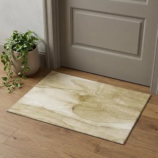 Beige And Ivory Abstract Washable Area Rug With UV Protection Photo 1