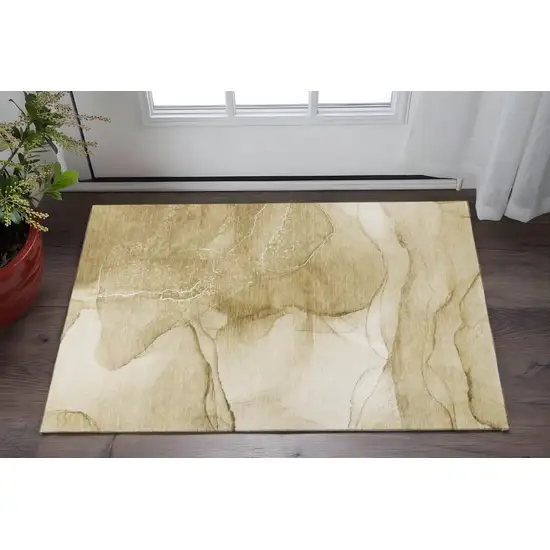Beige And Ivory Abstract Washable Area Rug With UV Protection Photo 2
