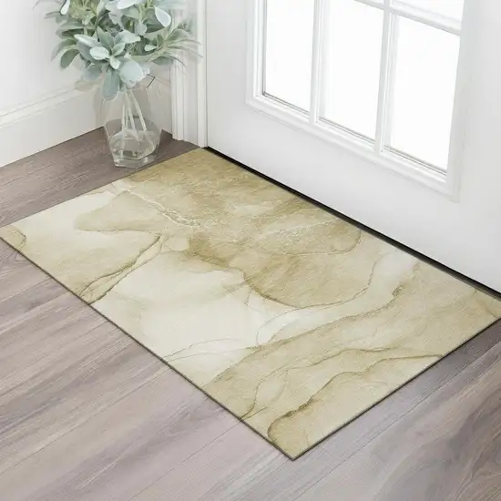Beige And Ivory Abstract Washable Area Rug With UV Protection Photo 1