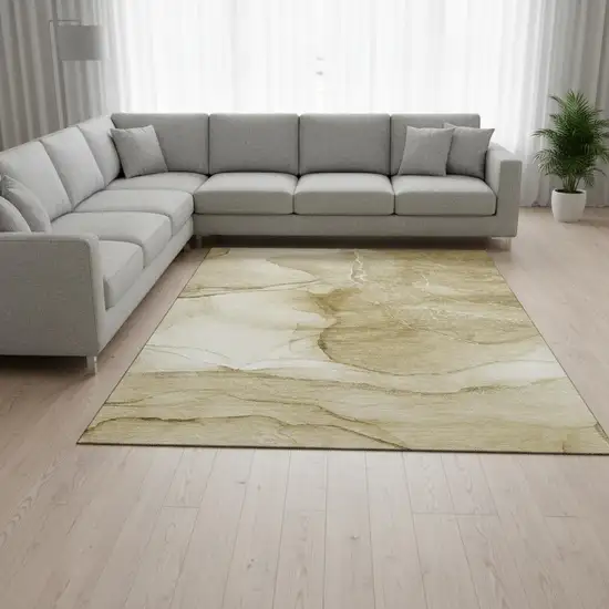 Beige And Ivory Abstract Washable Area Rug With UV Protection Photo 1