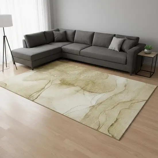 Beige And Ivory Abstract Washable Area Rug With UV Protection Photo 1
