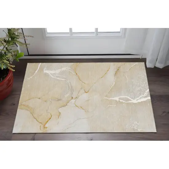 Beige And Ivory Abstract Washable Area Rug With UV Protection Photo 2